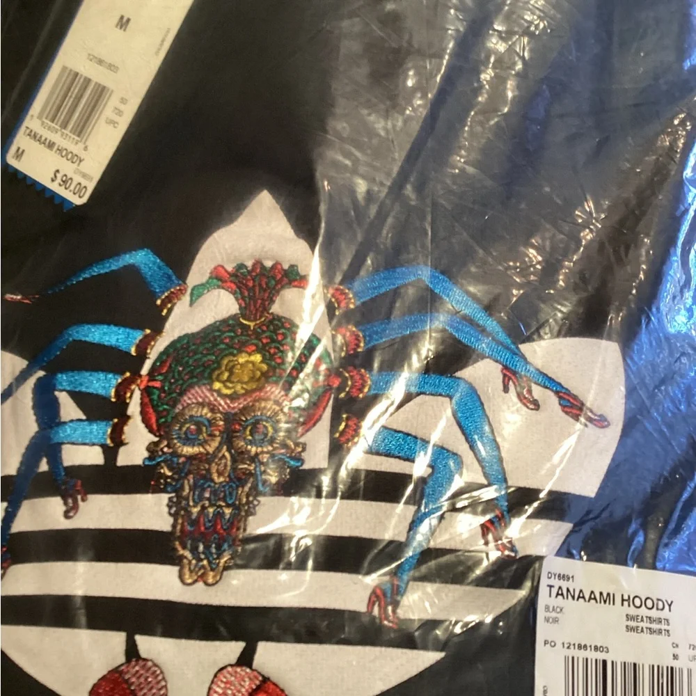 adidas sweatshirt featuring